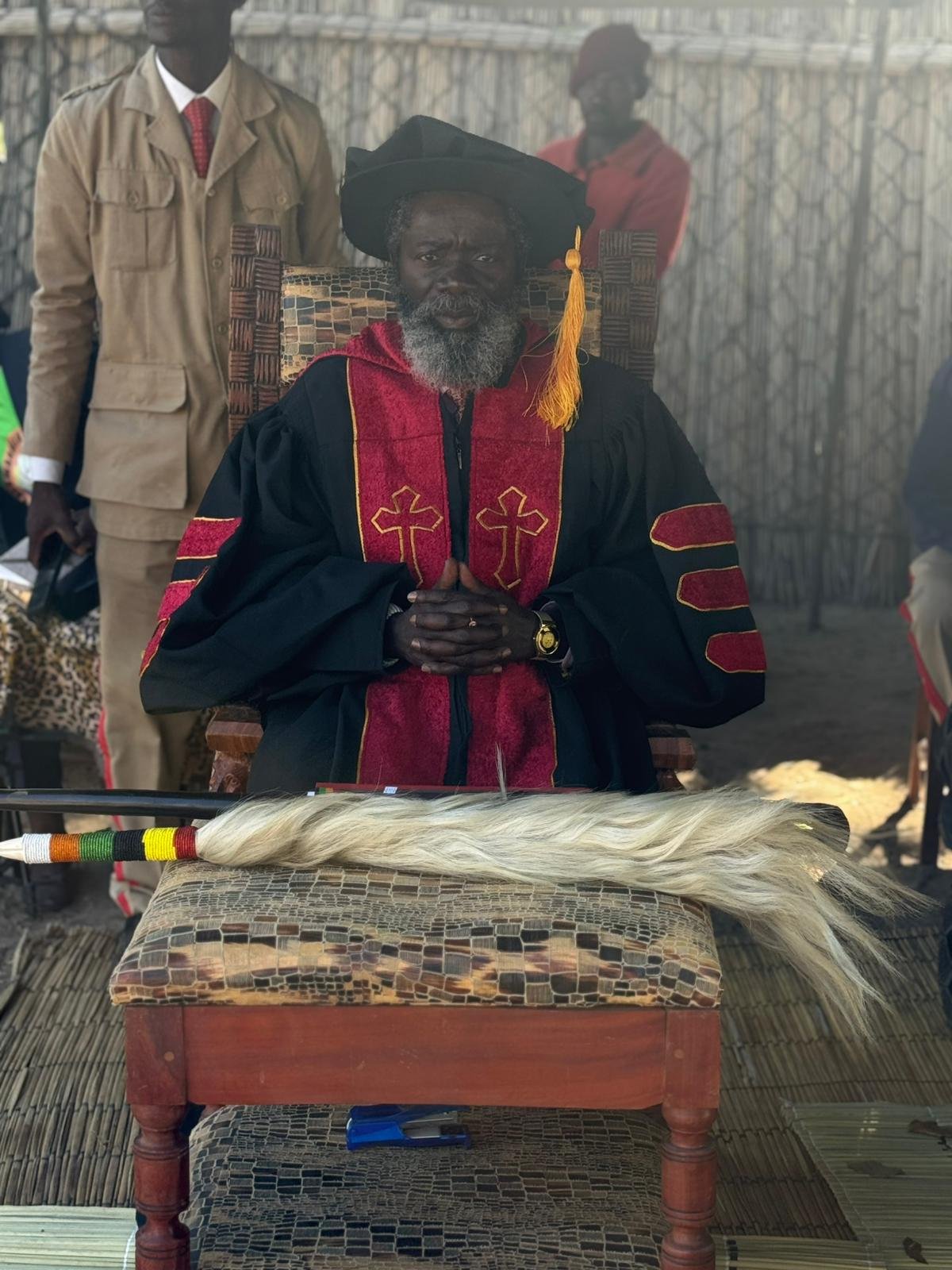 HRH Dr Mwanta Ishima Sanken'i VI seated in ceremonial regalia